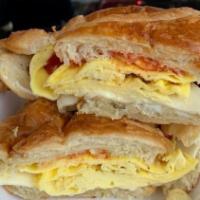#4 Bacon Egg  Croissant Sandwich · Come with lettuce, tomato, onion and cheese.