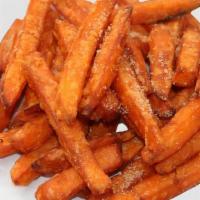 Sweet Potato Fun Fries · The perfect mix of savory and sweet. Topped with a touch of brown sugar