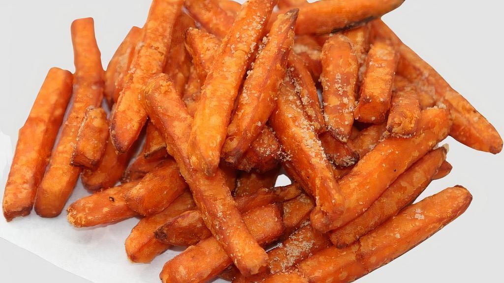 Sweet Potato Fun Fries · The perfect mix of savory and sweet. Topped with a touch of brown sugar