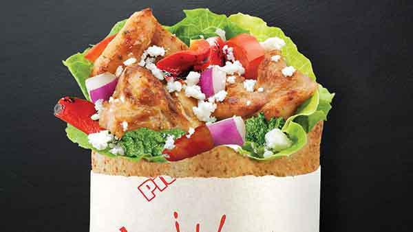 Chicken Pesto Pita · Chicken grilled in pesto, romaine lettuce, roasted red peppers, tomatoes, onions, feta, Greek seasoning.