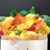Awakin' With Bacon Pita · Bacon, eggs, spinach, green peppers, onions, Cheddar cheese, ancho chipotle sauce, salt, and...