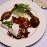 Peking Duck (Half) · The perfect roast duck with crispy golden brown skin and succulent meat. Wrapped in four thi...