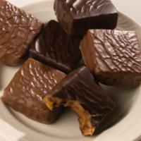 Caramels · Caramel squares covered in milk or dark chocolate