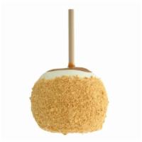 Cheesecake · A Granny Smith apple covered in fresh caramel, rolled in white confection, topped with crush...