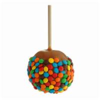 M&M · A Granny Smith apple covered in fresh caramel, rolled in M&M candies.