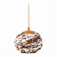Pecan Bear (Turtle) · A Granny Smith apple covered in fresh caramel then rolled in chopped pecans, drizzled in mil...