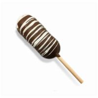 Chocolate Twinkie · Milk chocolate dipped Twinkies on a stick
