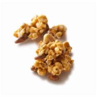 Rocky Pop · Caramel covered popcorn with almonds