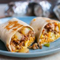 Sausage Breakfast Burrito · Two scrambled eggs, sausage, hash browns, and melted cheese wrapped in a fresh flour tortilla.