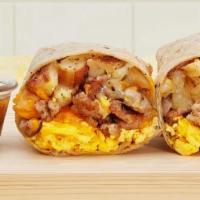 Basic Breakfast Burrito · Two scrambled eggs, hash browns, and melted cheese wrapped in a fresh flour tortilla.