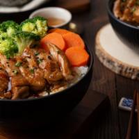 The Teriyaki Chicken Bowl · Delicious, sweet chicken diced and tossed in a tangy teriyaki sauce, served with fresh veget...