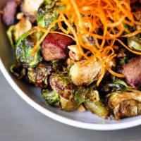Brussels Sprouts · Honey Butter, Smoked Ham, Roasted Hazelnuts, Sweet Potato Hay