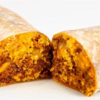 Chorizo Burrito · Chorizo cooked with scrambled eggs topped with cheddar- jack cheese and rolled in a flour to...