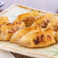 Koon Mando (Pan Fried Dumplings) · Pan fried dumplings.
