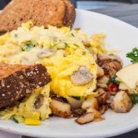 Farmers Scramble · Squash, zucchini, broccoli, mushroom, and jack cheese. made with three eggs and served on to...