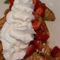 French Toast · Served with two eggs two pieces of bacon or sausage or a slice of ham.