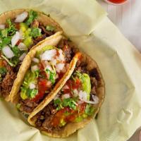 Taco · Street tacos with choice of meat.