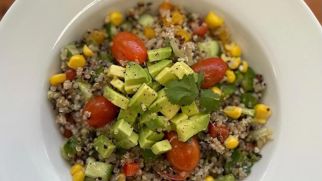 Quinoa Salad · Tricolored Quinoa mixed with Bell Peppers, cucumbers, green onions, cilantro, cherry tomatoes and tossed with a Lemon vinaigrette.  Topped with acovado