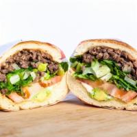 Tortas · Hot sauce, your choice of meat, onions, cilantro, beans, lettuce, tomato, mayonnaise, and av...