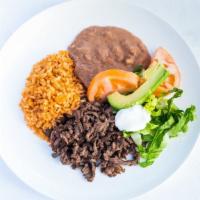Mexican Plate · Meat, rice, beans, lettuce, tomato, avocado, sour cream, & flour or corn tortillas.
