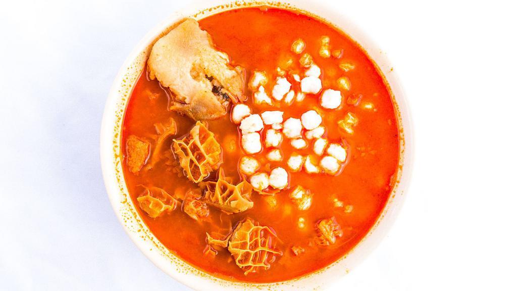 Menudo · Served with hominy, beef feet, & flour or corn tortillas.