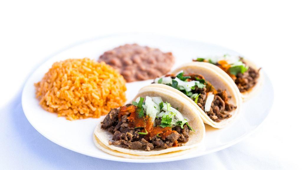 3 Taco Combo · 3 Tacos, rice, beans & drink.