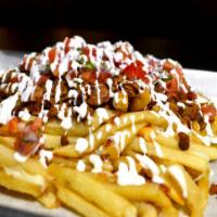 Monster Fries/Asada Fries · French fries served with melted mozzarella cheese, pico de gallo, sour cream, and your choic...