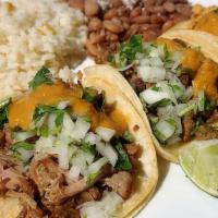Calle Taco Plate · Three tacos served with your choice of meat, topped with onions, cilantro and our house sauc...