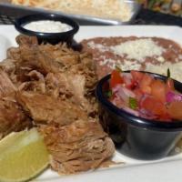 Carnitas Plate · Braised pork, white rice, and whole beans, served with sour cream, cotija cheese, and pico d...