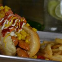 Veggie Dogo · Vegetarian hot dog (apx 74 lb.) topped with fresh tomatoes and onions, ketchup, mayonnaise, ...