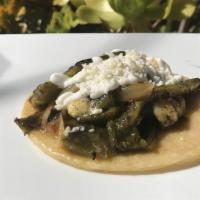 Rajas Con Queso Taco · Sliced fresh pasilla peppers sautéed with oaxaca and queso fresco cheeses, and additional sp...