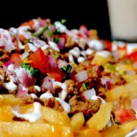 Monster Fries / Asada Fries · French fries served with melted mozzarella cheese, pico de gallo, sour cream, and your choic...