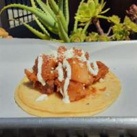 Papas Con Chorizo Taco · Potatoes, soybean chorizo, and various spices. Topped with sour cream and dried cotija cheese.