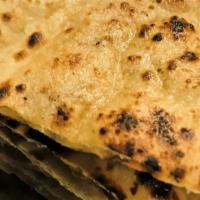 Roti · Special whole wheat bread baked in tandoori (clay oven).
