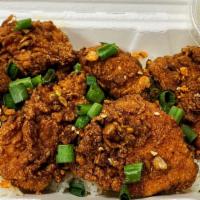 Seoulcal Rice Bowl · Korean fried chicken tossed in choice of sauce over a bed of steamed white rice, a side of s...