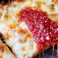 Sicilian Cheese Slice · Traditional Sicilian deep dish pan-pizza, All natural mozzarella cheese, house-made dough & ...