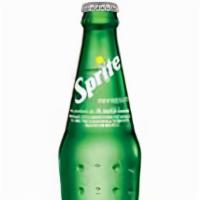 Sprite (355 Ml) · Old school sprite soft drink glass bottle.
