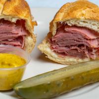 Hot Corned Beef Sandwich (Med) · Hot Corned Beef on your choice of bread. Deli Mustard on the side.
