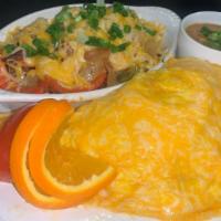 Jambalaya Omelet · Sautéed shrimp, smoked sausage, with diced trio bells onions, green onions, folded in three ...