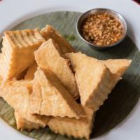 Fried Tofu · Crispy tofu squares tossed in sweet chilli sauce.