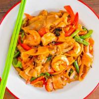 Pad Kee Mao · Drunken noodles, flat rice noodles, Thai holy basil, chili, garlic, and sweet soy sauce.