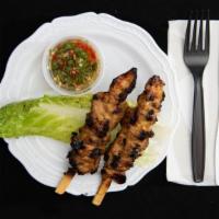 Chicken Skewer (1) · Marinated with lemongrass, oyster sauce, garlic, black pepper, BBQ over mesquite charcoal.