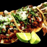 Your Taco Plate · Traditionally seasoned street tacos your choice of meats in one plate.