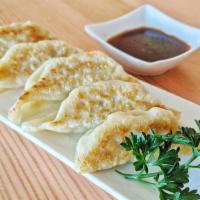 Chicken Gyoza  · Choice of pan-fried or deep fried. Served with chili-ponzu sauce. 5 pieces