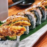 Spider Roll · Deep fried soft-shell crab, avocado, cucumber, gobo, kaiware and sweet sauce.