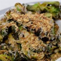 Brussels Sprouts
 · Almond vinaigrette smoked almond crumble and Parmesan cheese.