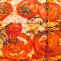 Margherita Flatbread
 · Fresh mozzarella, tomato and basil.