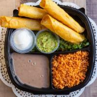 Taquito Plate · Crunchy homemade Chicken or Beef taquitos on a bed of lettuce, sour cream and guacamole, Ser...