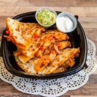 Fajita Quesadilla · Flour tortilla, grilled chicken or beef, onions, bell peppers, tomatoes, cheese, guacamole, ...