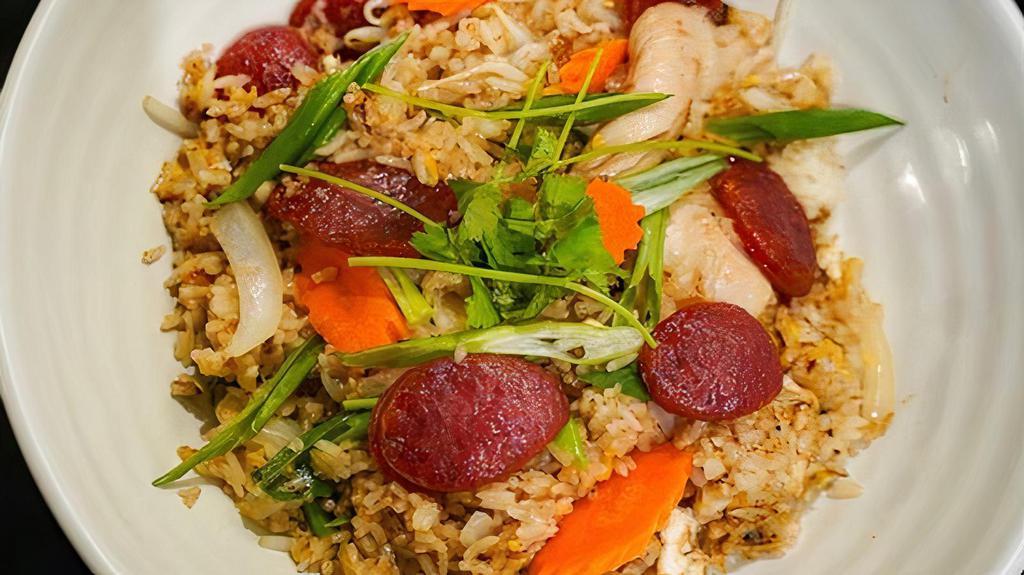 Hong Kong Fried Rice · Jasmine Rice, Egg, Chinese Sausage, Chicken, Bean Sprouts, Carrots, White Onions, Green Onions *None Selectable Protein Choice*